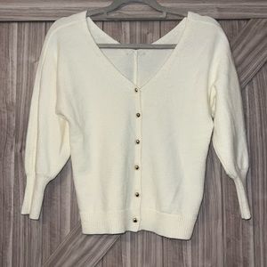 14. Another Love cream cardigan sweater